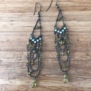 Yellow and gold colored chandelier earrings